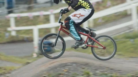 Tracking Shot: BMX Racer (Super Slow Motion) Stock Footage 59582657