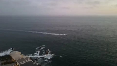 Tracking shot of boat headed toward the Newport Entrance Channel Stock Footage 201102727