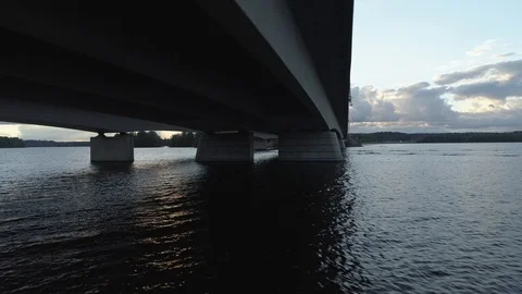 Tracking shot of a boat under the bridge Stock Footage 86486961