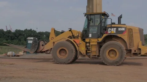 Tracking Shot of Bulldozer at a Construction Site Stock Footage 80209581