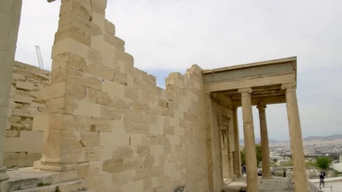 Tracking shot camera moves around Erechtheion temple to Porch of Maidens Stock Footage 92437625