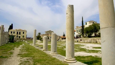 Tracking shot camera moves around ruins of Hadrian's Library in Athens Greece Stock Footage 92438593