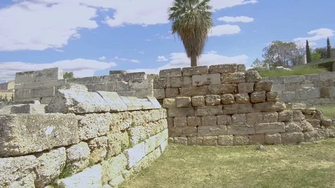 Tracking shot camera moves around the ruins of The Roman Agora Stock Footage 92441947
