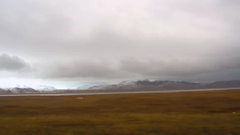 Tracking shot camera moves in a beautiful landscape meadow and mountain Stock Footage 93968417