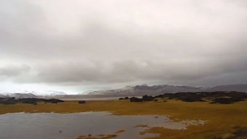 Tracking shot camera moves in a beautiful landscape meadow and mountain Video stock 93968448