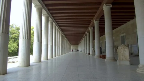 Tracking shot camera moves forward in interior length of Stoa of Attalos Athens Stock Footage 92438808