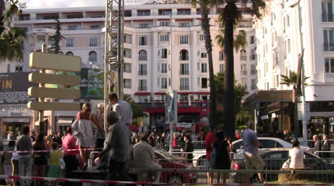 Tracking Shot from Car Crowded Cannes street during film festival Stock Footage 22516751