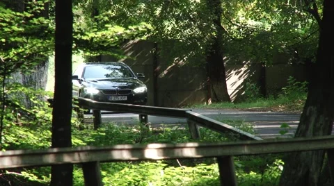 Tracking shot of a car in the forest Video stock 46123994