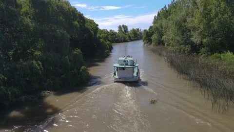 Tracking shot of cargo ship in Amazon River Stock Footage 151700681