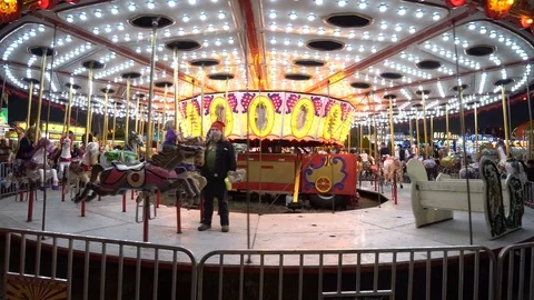 Tracking Shot of Carousel at Florida State Fair at Night Stock-Footage 125435098