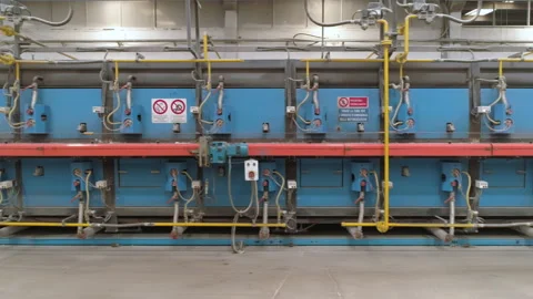 Tracking Shot Ceramic Tile Tunneling Kiln in a Factory Stock Footage 167135282