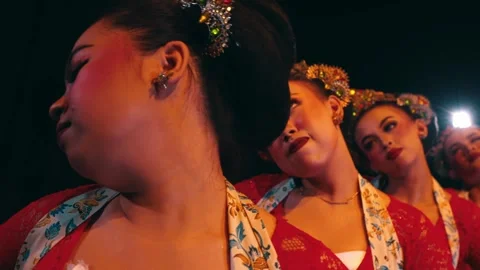Tracking Shot Close-up of Javanese Dancers' Faces and Head Movements Stock Footage 263900550