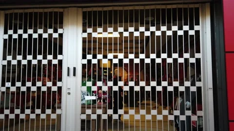 Tracking shot of a closed store in a mall Stock Footage 143985820