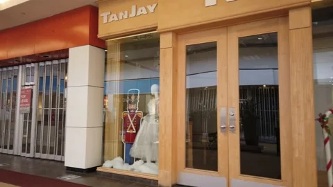 Tracking shot of closed stores in a mall Stock Footage 143985903