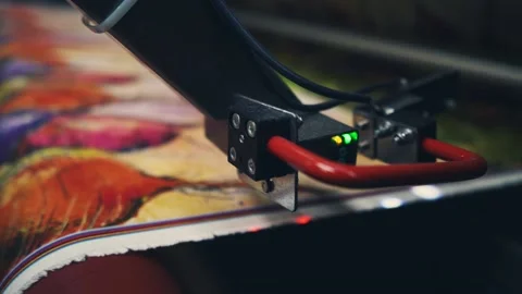 Tracking shot of device in printing machine Stock Footage 135160814