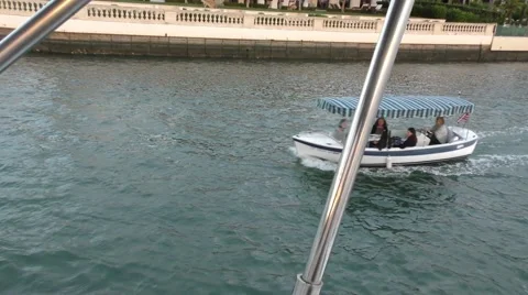 Tracking shot of dinghy crusing by anchored Race Committee motorboat view fro Video stock 67488604