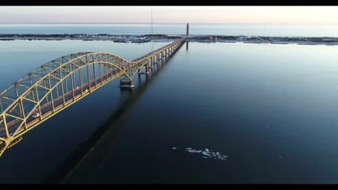 Tracking shot down bridge with moving traffic on it Stock Footage 155466434