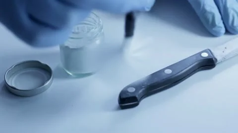 Tracking shot dusting knife for fingerprints Stock Footage