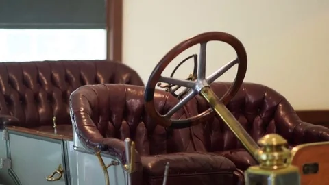 Tracking shot of early automobile Stock Footage 78558113