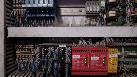 Tracking shot of electrical panel with fuses, relay, switches and contactors Video stock 75033983