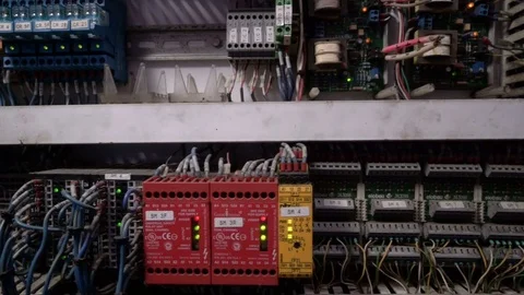 Tracking shot of electrical panel with fuses, relay, switches and contactors Video stock 75039896