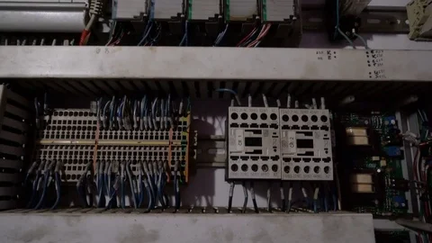 Tracking shot of electrical panel with fuses, relay, switches and contactors Video stock 75039954