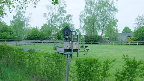 Tracking shot of an empty children's playground Stock Footage 336845054