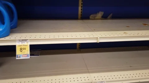 Tracking shot of empty grocery store shelves - laundry aisle Stock Footage 126532441