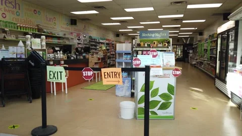 Tracking shot of enter exit store Stock Footage 143985730