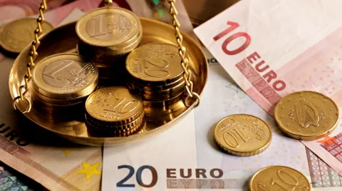 Tracking shot of Euro notes and coins Stock Footage 955624