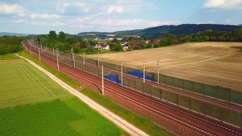 Tracking shot of freight train meeting passanger train Stock Footage 108590876