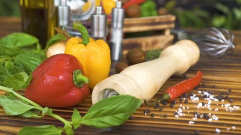 Tracking shot fresh vegetable background and seasoning for food preparation Stock Footage 98445148