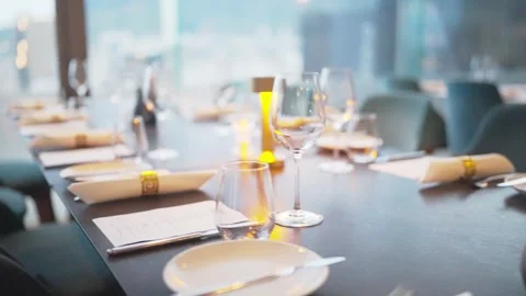 Tracking Shot Gliding Over Elegant Table Setting in Upscale Restaurant or Stock Footage 346653951