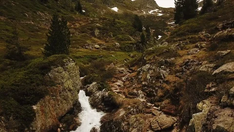 Tracking shot going over wild mountain stream in France Video stock 116325211