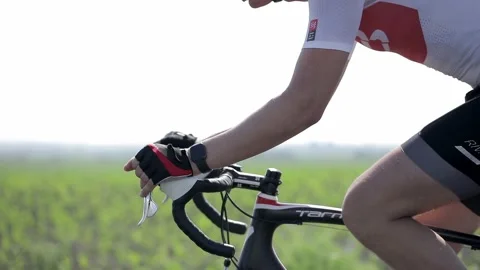 Tracking shot of a group of cyclists on country road. 動画素材 142875153