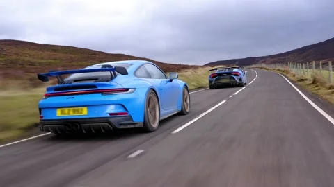 Tracking shot of GT3 and Lambo STO. Stock Footage