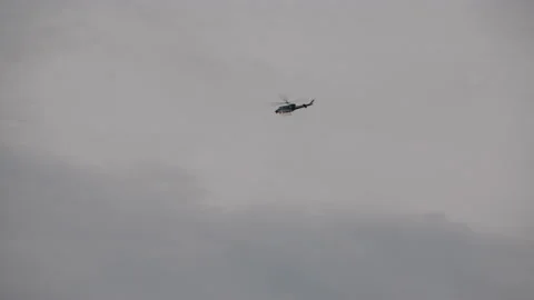 Tracking Shot of Helicopter in Washington, D.C. on Cloudy Winter Day Video stock 226489093
