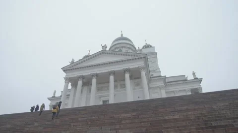 Tracking shot of Helsinki Cathedral from low angle with steps leading up Stock Footage 146290203