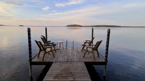Tracking shot of lake landscape from small jetty Stock Footage 250445597