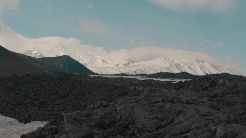Tracking Shot of Lava Field with a View on Tolbachik Volcano Stock Footage 166819956