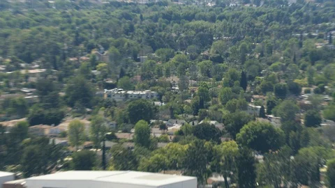 Tracking shot of light jet zooming off, day Stock Footage 101807784