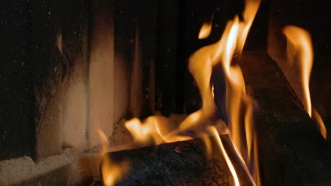 Tracking shot of logs burning in fireplace Stock Footage 148947236