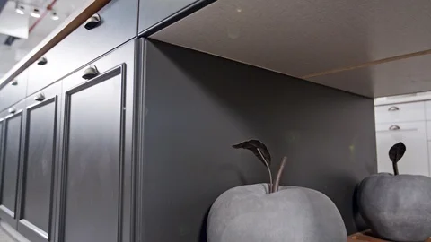 Tracking shot of a luxury kitchen with gray and white classic design Stock Footage 112107443