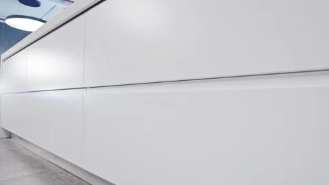 Tracking shot of a luxury kitchen with white modern design Stock Footage 112107911