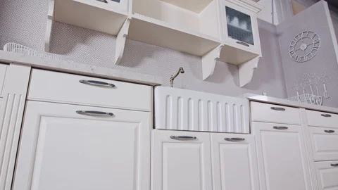 Tracking shot of a luxury kitchen with white classic design Stock Footage 112112291