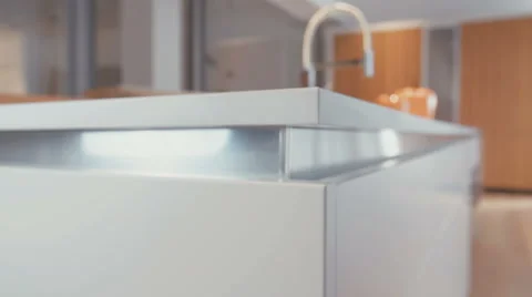 Tracking shot of luxury white kitchen with modern design Video stock 63499616