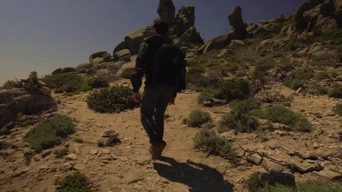 Tracking shot of man hiking Stock Footage 75176430