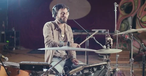 Tracking shot of a Man playing drums in a club Stock Footage 71466973