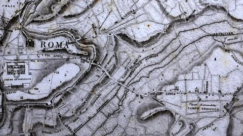 Tracking shot on a map representing the ancient streets of Rome Vidéo 90134634