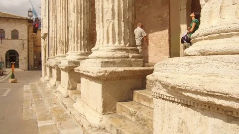 Tracking shot from marble stairs to columns, Assisi Video stock 82073183